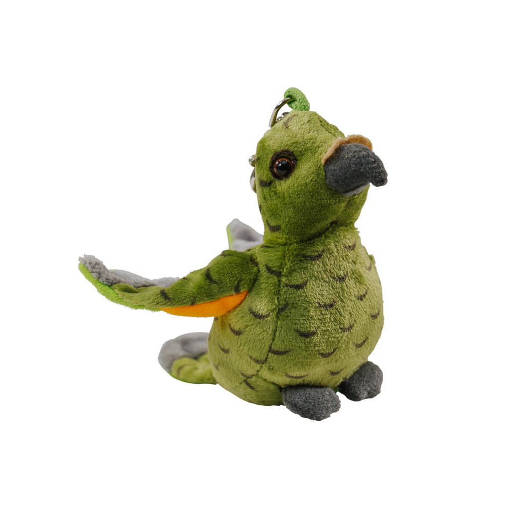 A soft toy kea with a key clip attached