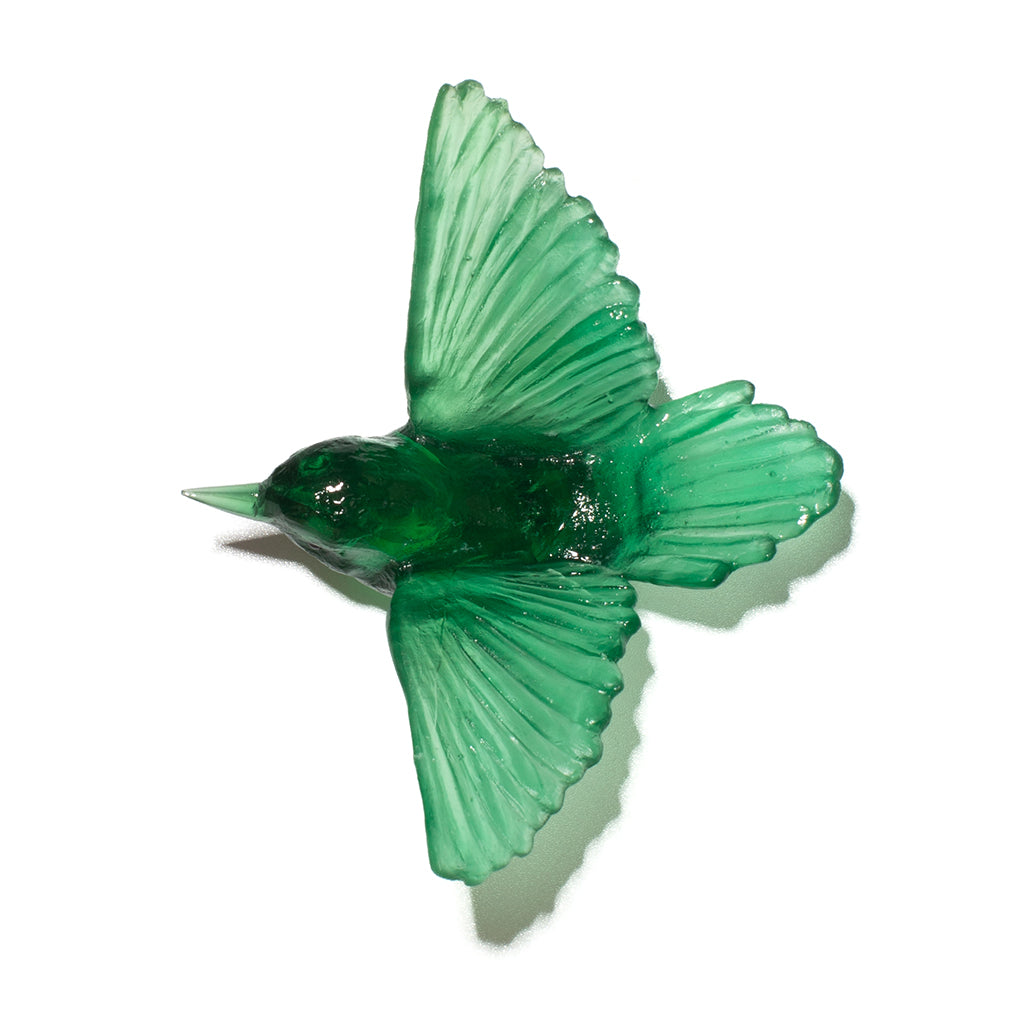 A translucent green glass bird figurine, a tomtit, shown against a plain white background with a soft shadow.