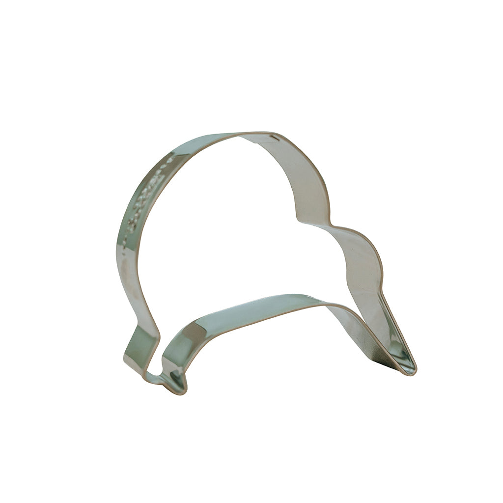A silver-colored cookie cutter in the shape of a kiwi.