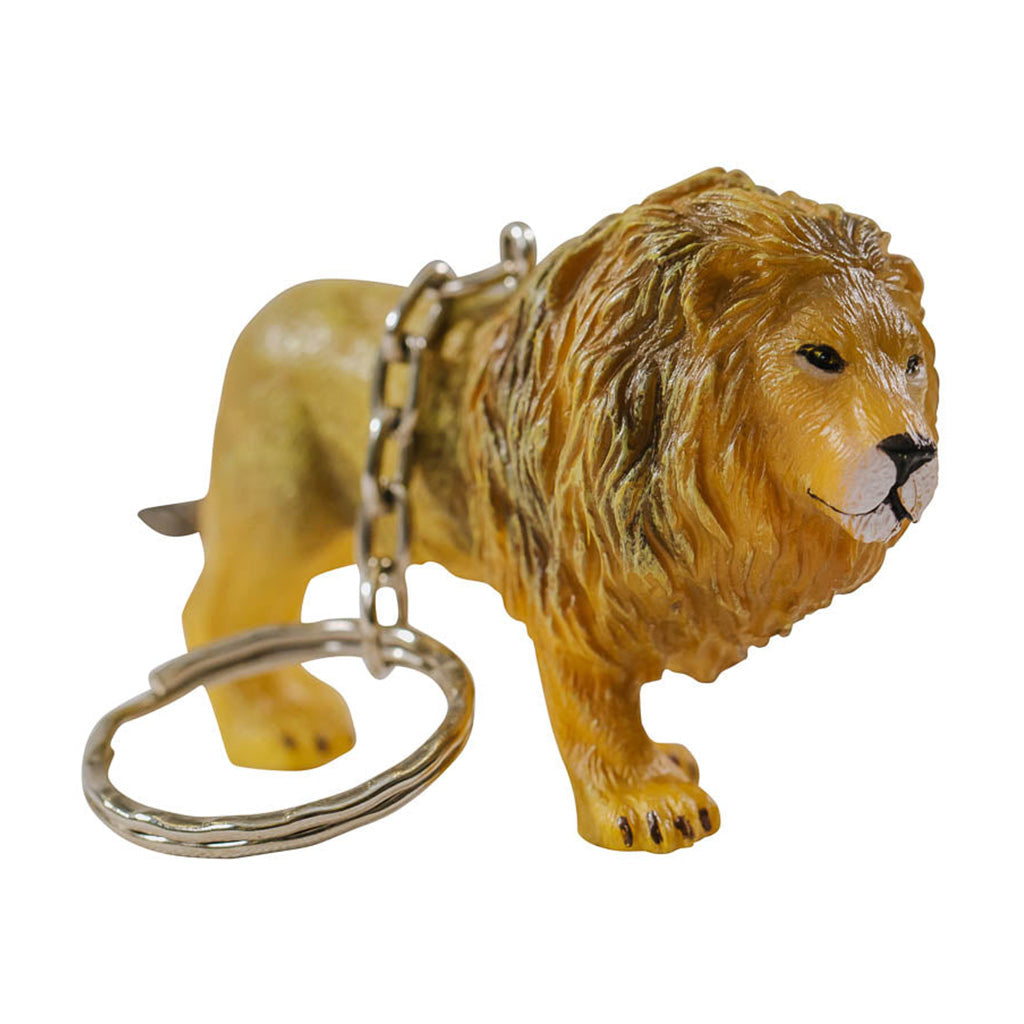 A yellow male lion with a chain and keyring attached