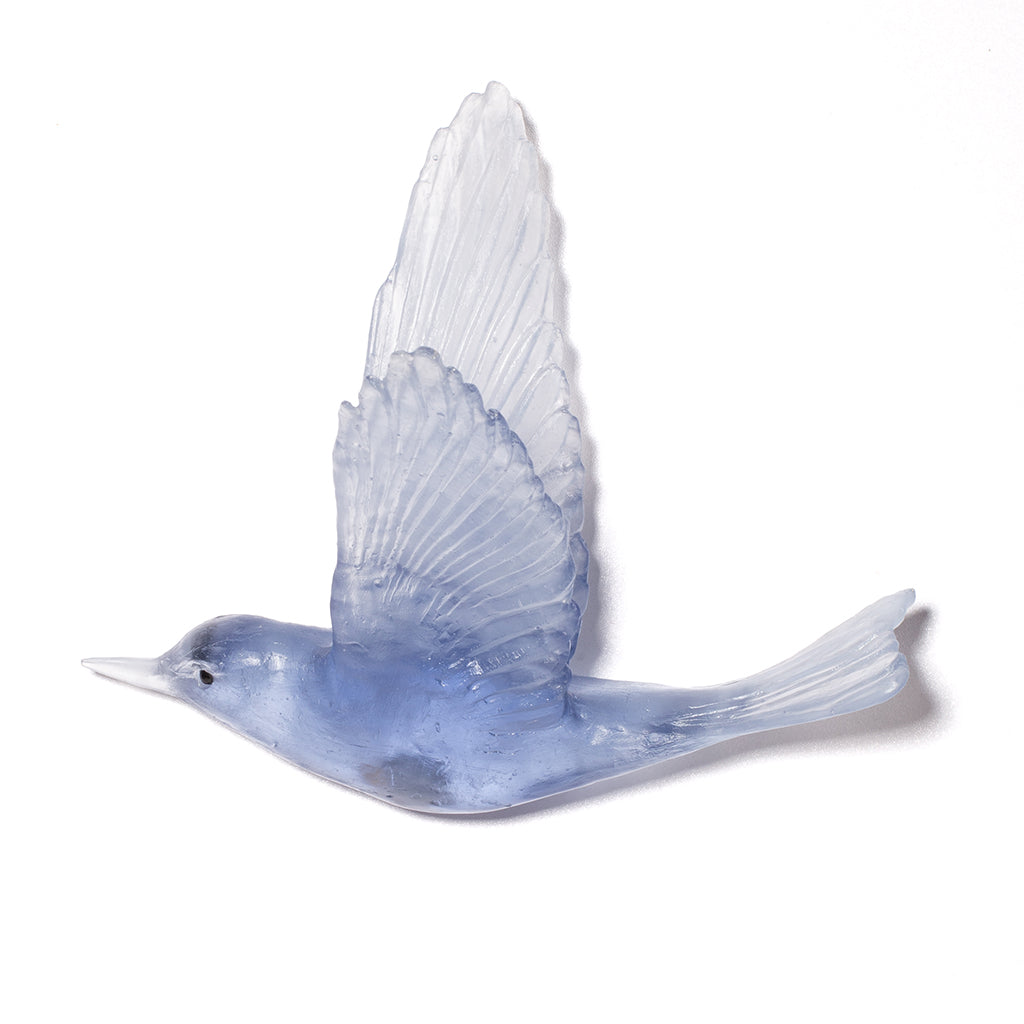 A translucent light blue glass bird sculpture or wall art piece shown in side profile against a plain white background.
