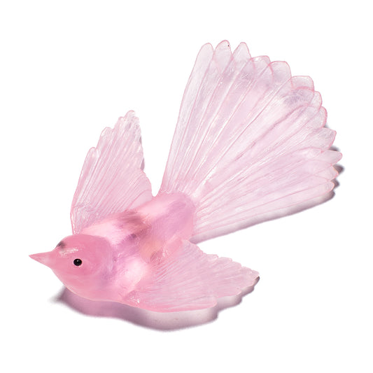 A translucent pink bird figurine with delicate wings and a small black eye, isolated on a white background.