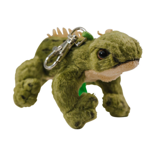 A plush toy of a green tuatara reptile with a keyclip accessory.
