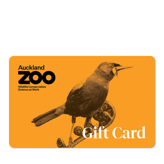 A physical gift card from Auckland Zoo featuring an illustration of a bird on an orange background.