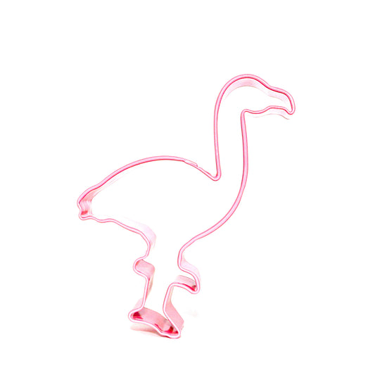 A pink cookie cutter in the shape of a flamingo