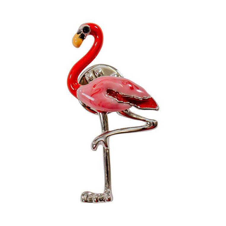 A pink and silver flamingo brooch