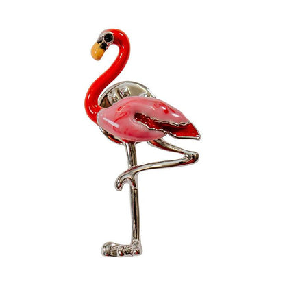 A pink and silver flamingo brooch